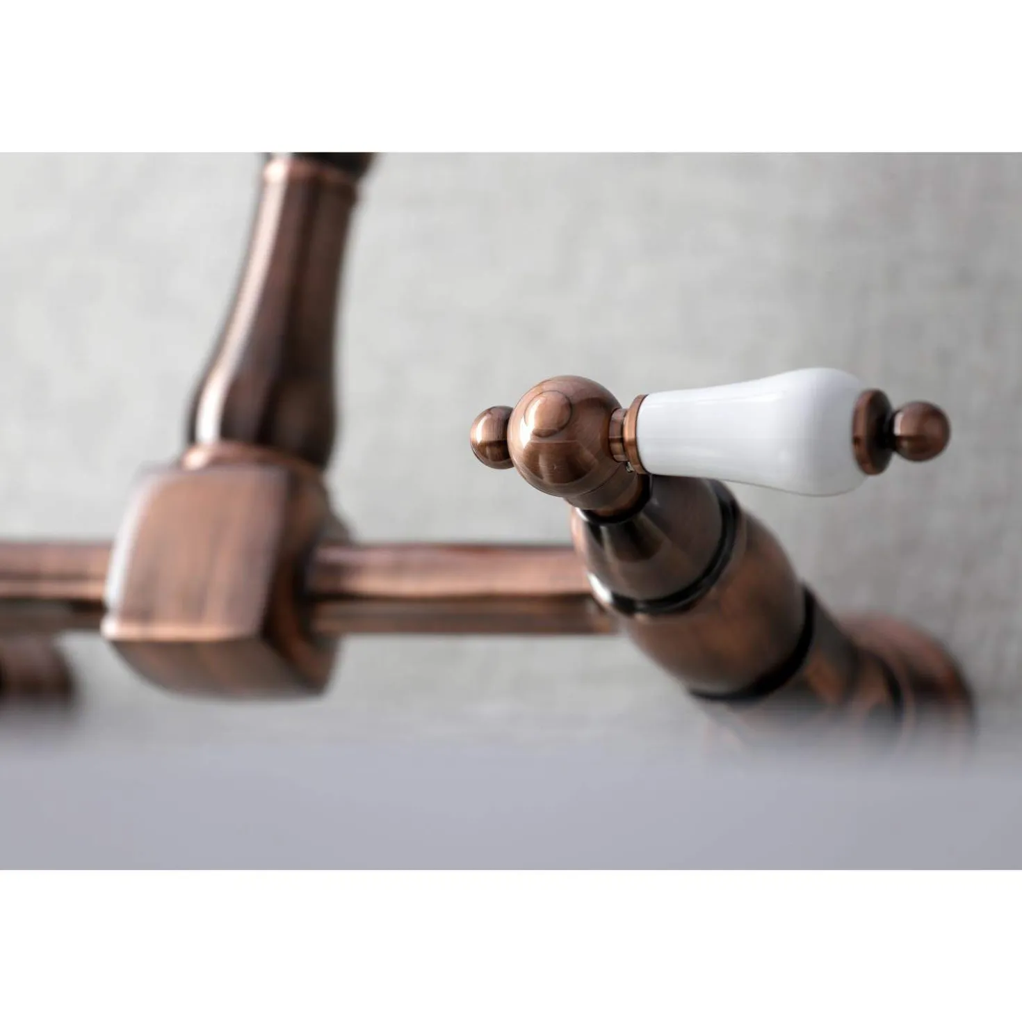 Kingston Brass KS124PLAC Heritage Two-Handle Wall Mount Bridge Kitchen Faucet, Antique Copper