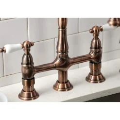 Kingston Brass KS127PLBSAC Heritage Bridge Kitchen Faucet with Brass Sprayer, Antique Copper