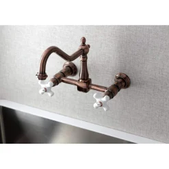 Kingston Brass KS124PXAC Heritage Two-Handle Wall Mount Bridge Kitchen Faucet, Antique Copper