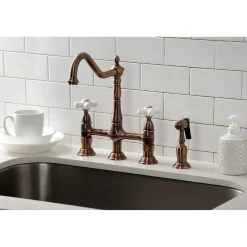 Kingston Brass KS127PXBSAC Heritage Bridge Kitchen Faucet with Brass Sprayer, Antique Copper
