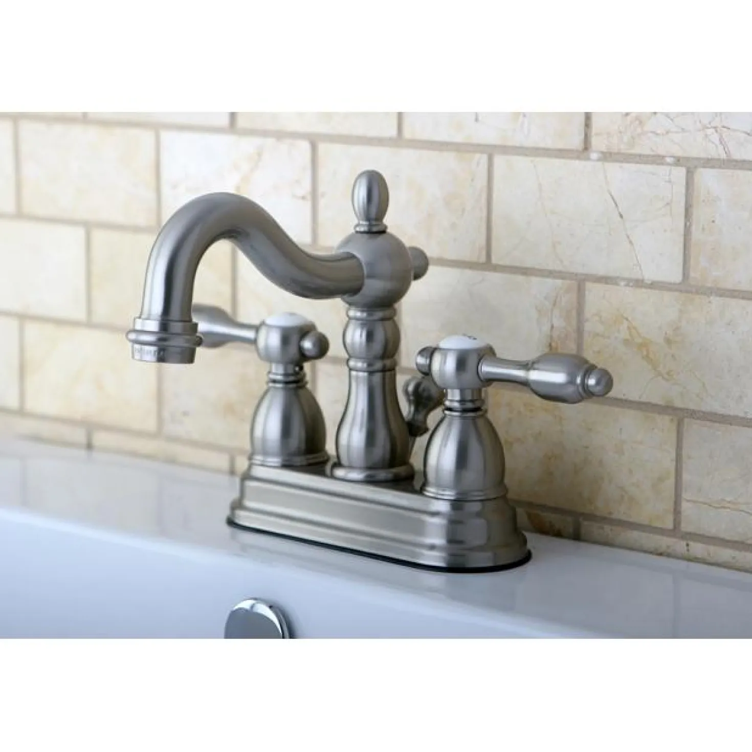 Kingston Brass KS1608TAL Tudor 4" Center Lavatory Faucet with Brass Pop-up