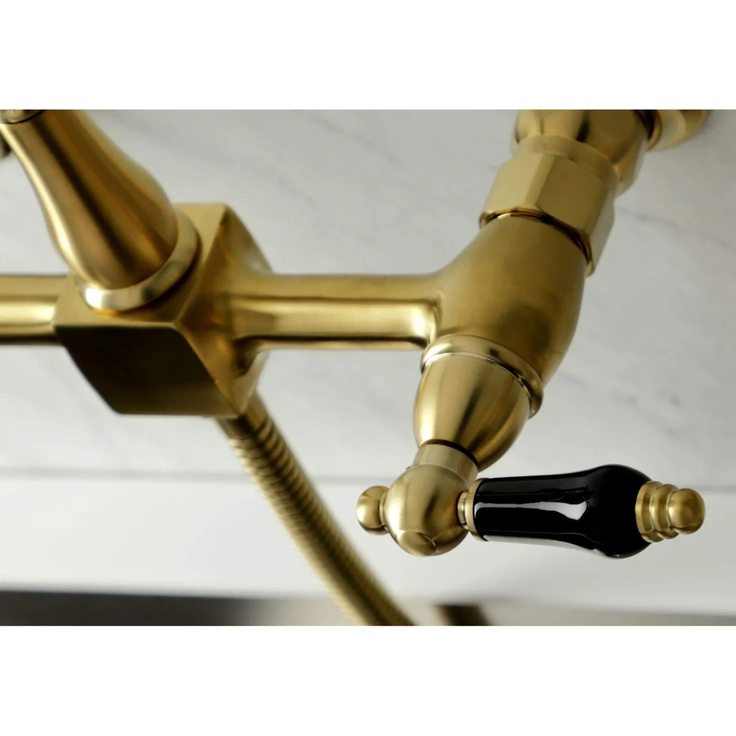 Kingston Brass KS126XPKLBS-P Duchess Wall Mount Bridge Kitchen Faucet with Brass Sprayer