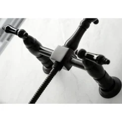 Kingston Brass KS126XPKLBS-P Duchess Wall Mount Bridge Kitchen Faucet with Brass Sprayer