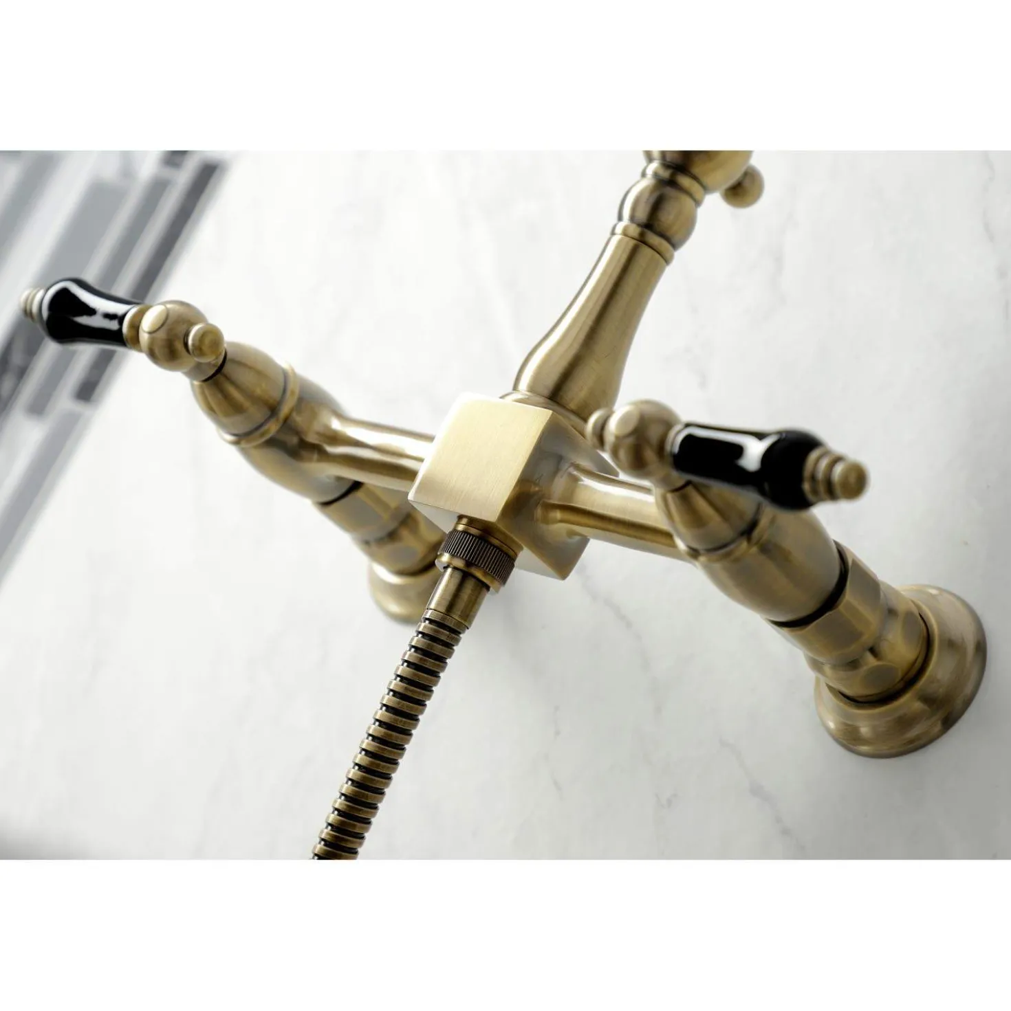 Kingston Brass KS124XPKLBS-P Duchess Two-Handle Wall Mount Bridge Kitchen Faucet with Brass Sprayer