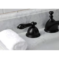 Kingston Brass KS396XPKL-P Duchess Widespread Bathroom Faucet with Brass Pop-Up