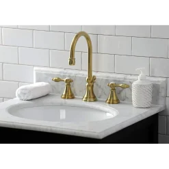 Kingston Brass KS298XTAL-P Tudor Widespread Bathroom Faucet with Brass Pop-Up