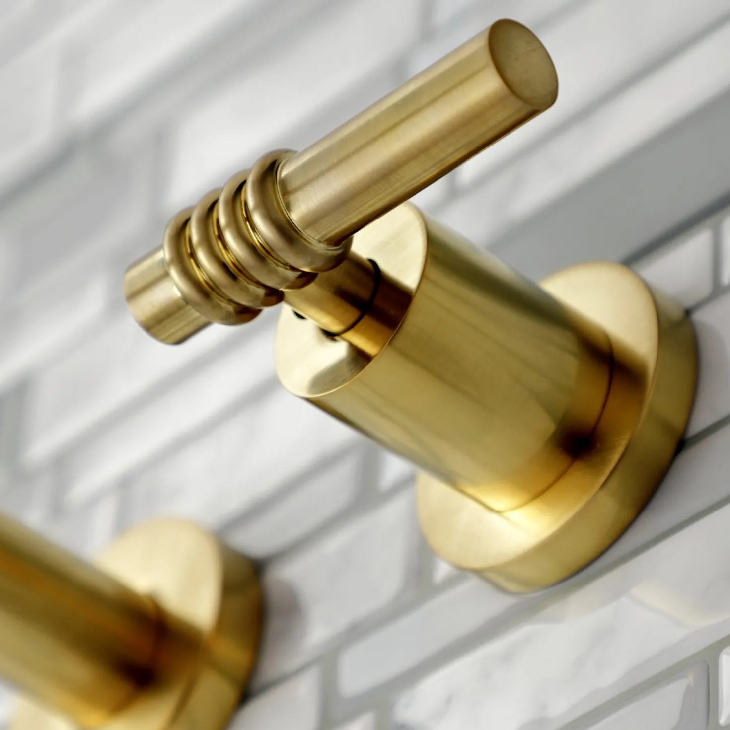Kingston Brass Milano 2-Handle 8-Inch Wall Mount Bathroom Faucet