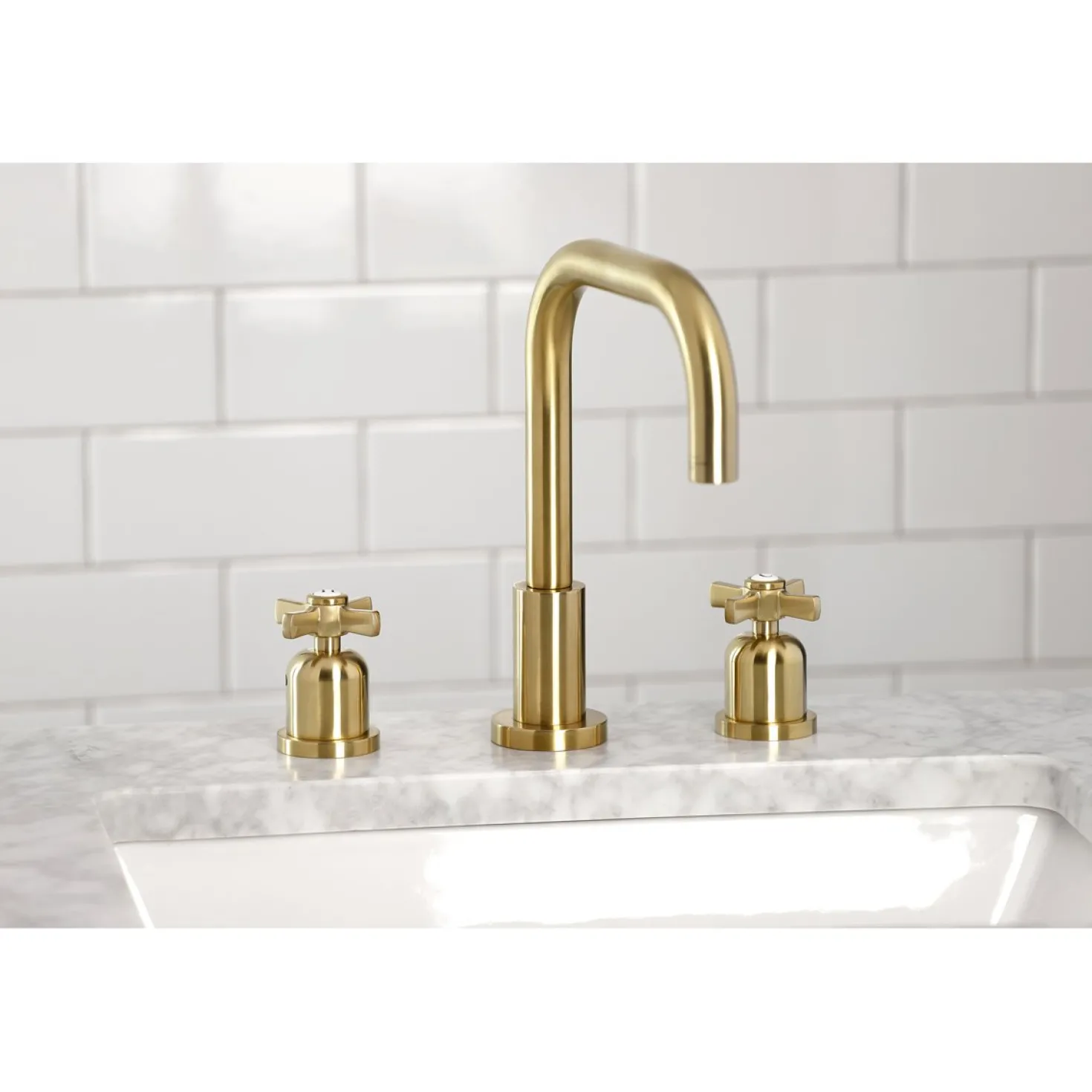 Kingston Brass Millennium Widespread Bathroom Faucet with Brass Pop-Up