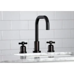 Kingston Brass Millennium Widespread Bathroom Faucet with Brass Pop-Up
