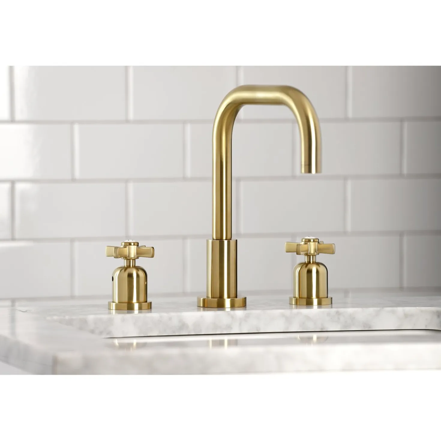 Kingston Brass Millennium Widespread Bathroom Faucet with Brass Pop-Up