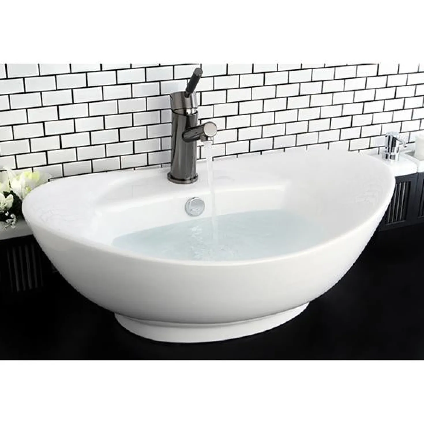 Kingston Brass NS8420DKL Water Onyx Single Handle Lavatory Faucet with Anti-Slide Handle Sleeve and Brass Pop up Drain in Black Nickel