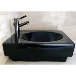 Kingston Brass NS8420DKL Water Onyx Single Handle Lavatory Faucet with Anti-Slide Handle Sleeve and Brass Pop up Drain in Black Nickel