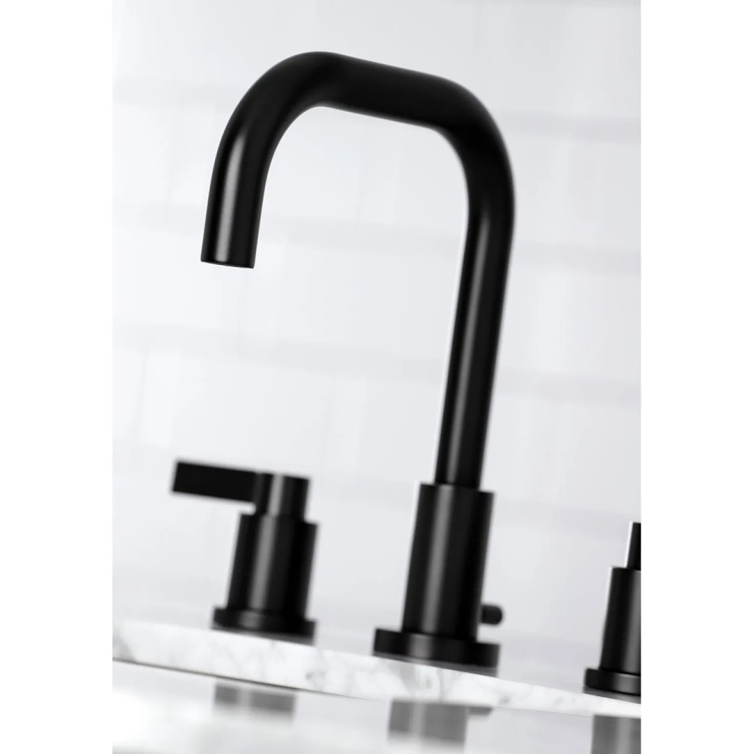 Kingston Brass NuvoFusion Widespread Bathroom Faucet with Brass Pop-Up