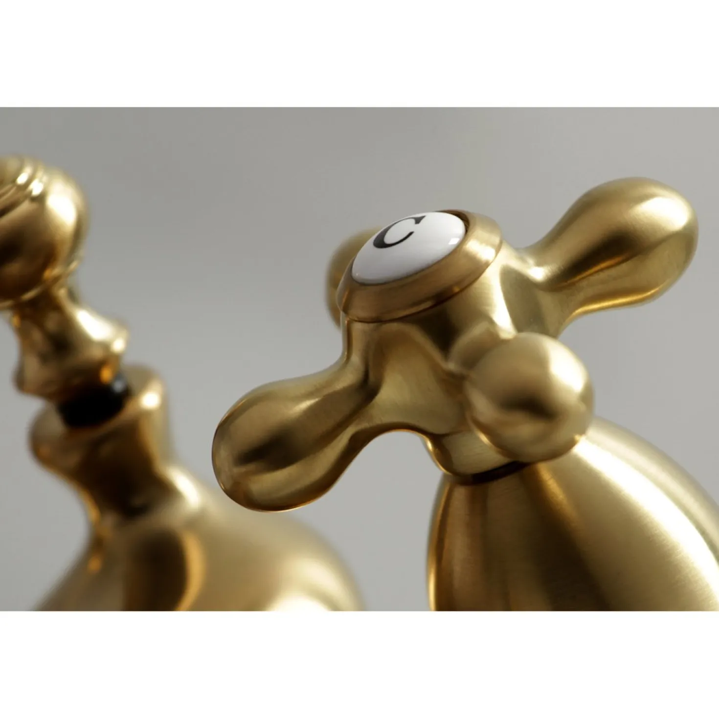Kingston Brass Restoration Cross-Handle 4-Inch Centerset Bathroom Faucet