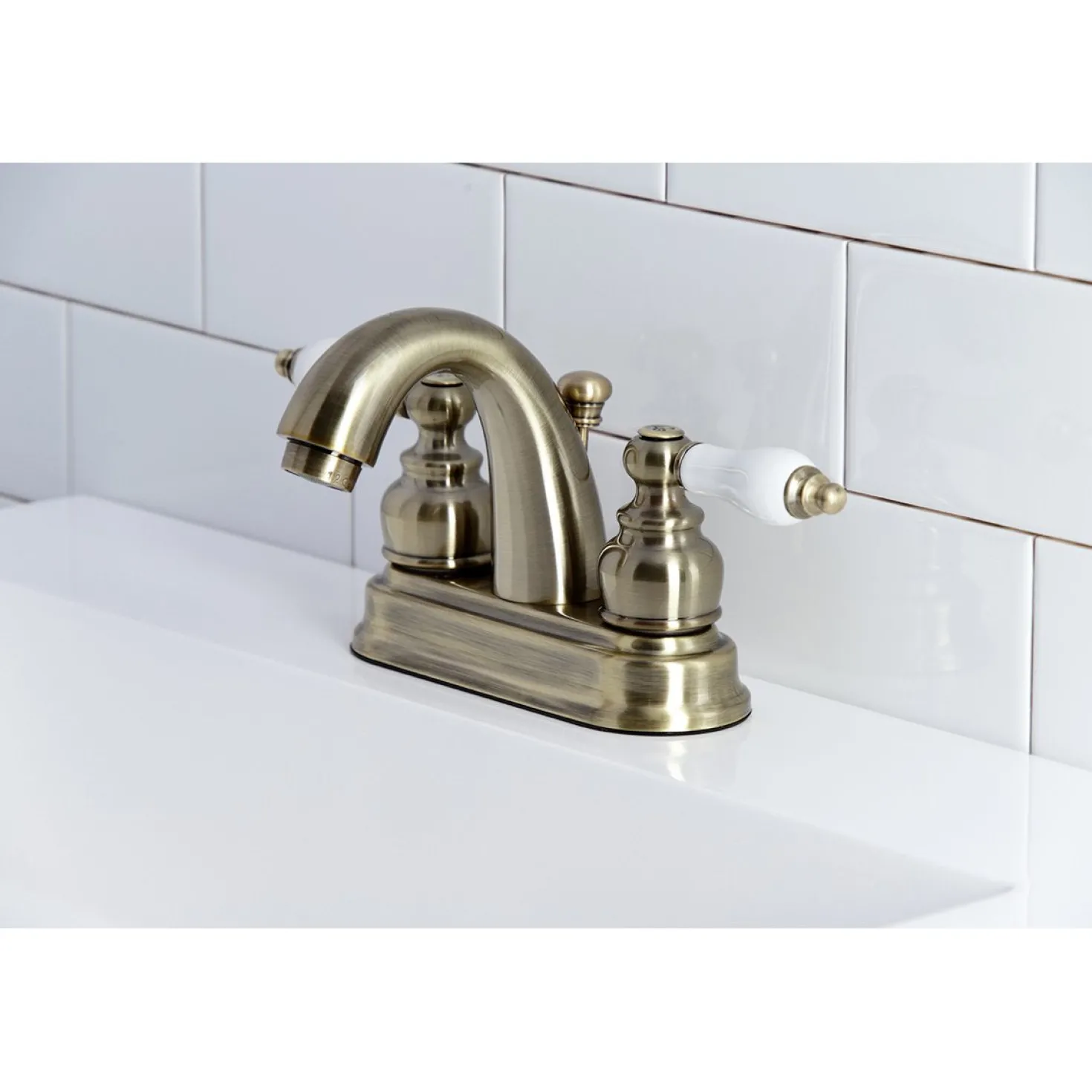 Kingston Brass Restoration Deck Mount 4-Inch Centerset Bathroom Faucet