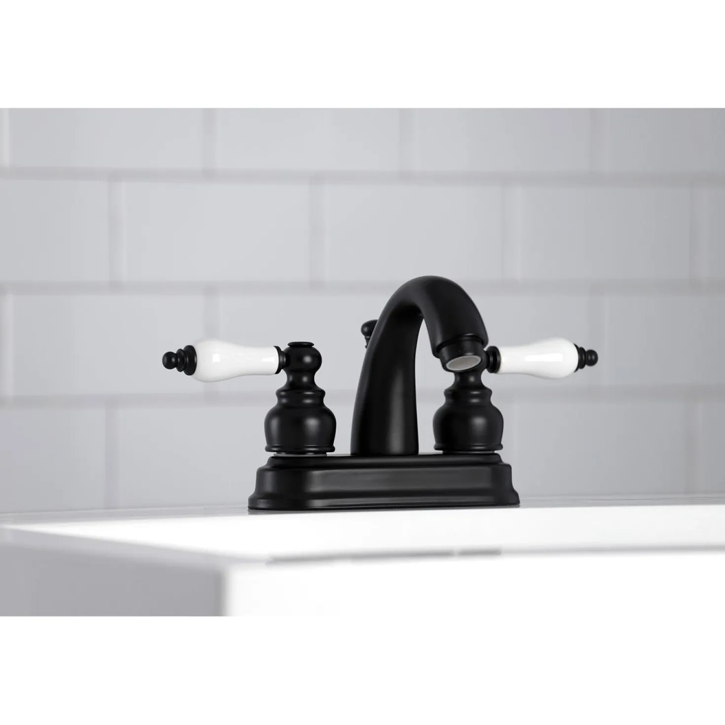 Kingston Brass Restoration Deck Mount 4-Inch Centerset Bathroom Faucet