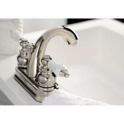 Kingston Brass Restoration Deck Mount 4-Inch Centerset Bathroom Faucet