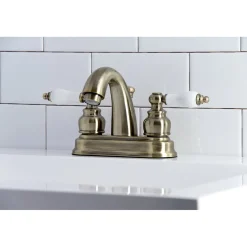 Kingston Brass Restoration Deck Mount 4-Inch Centerset Bathroom Faucet