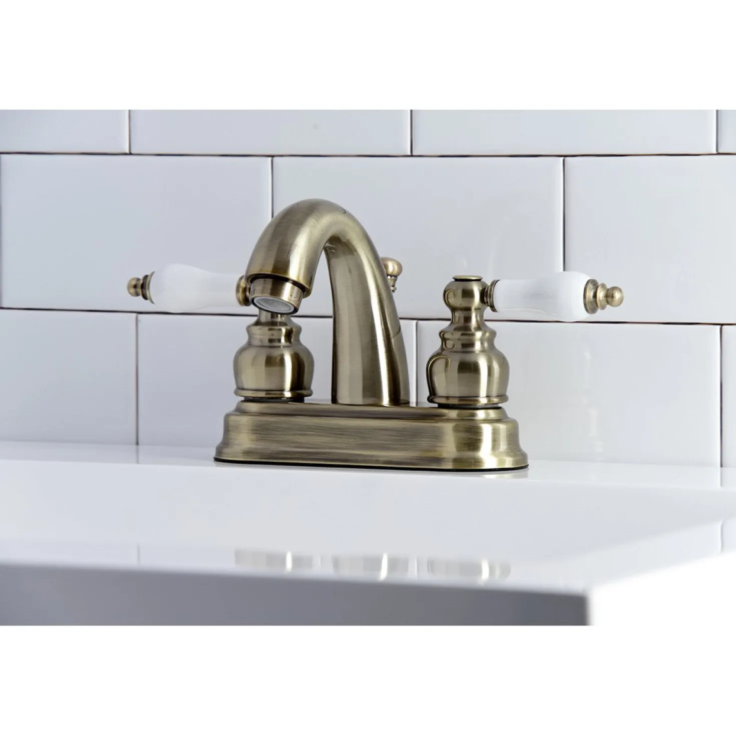 Kingston Brass Restoration Deck Mount 4-Inch Centerset Bathroom Faucet