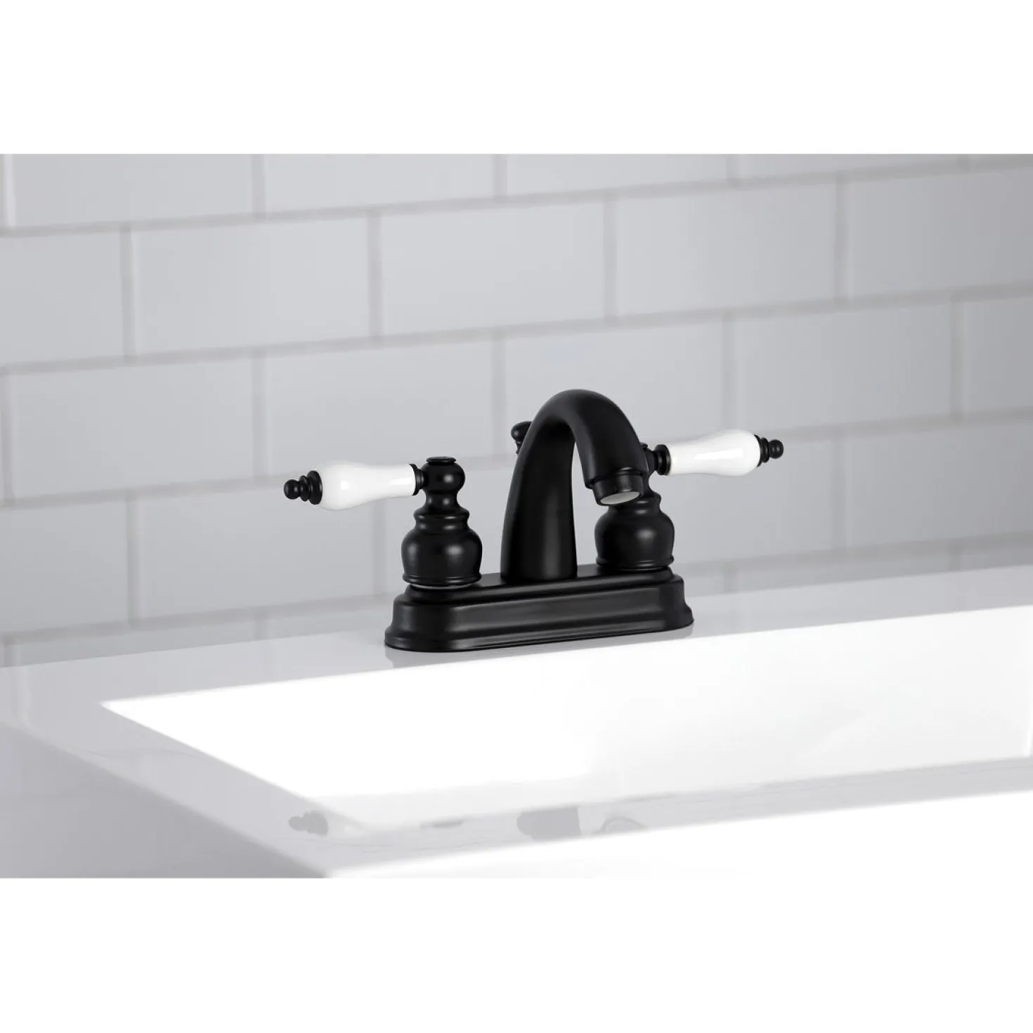 Kingston Brass Restoration Deck Mount 4-Inch Centerset Bathroom Faucet