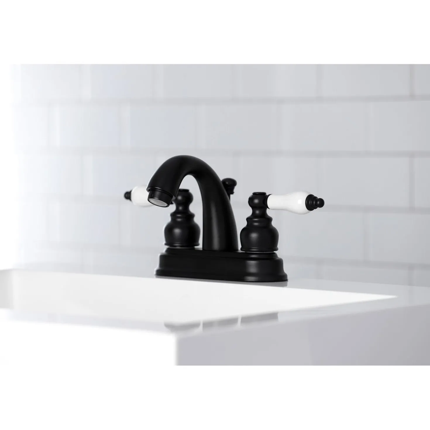 Kingston Brass Restoration Deck Mount 4-Inch Centerset Bathroom Faucet