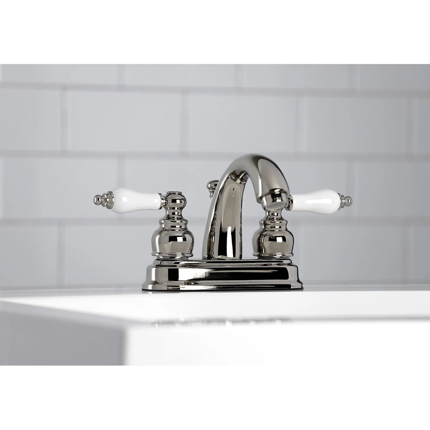 Kingston Brass Restoration Deck Mount 4-Inch Centerset Bathroom Faucet