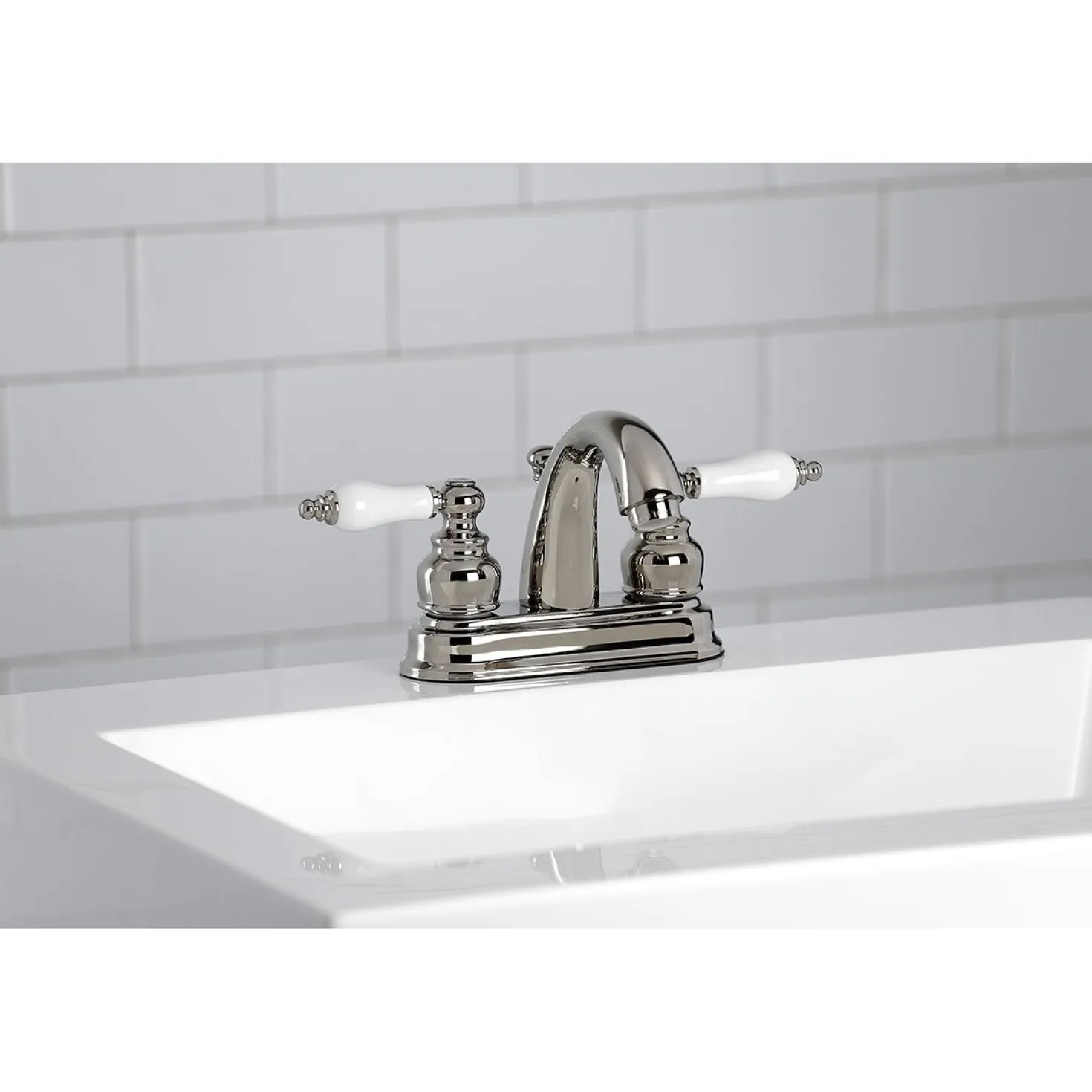 Kingston Brass Restoration Deck Mount 4-Inch Centerset Bathroom Faucet