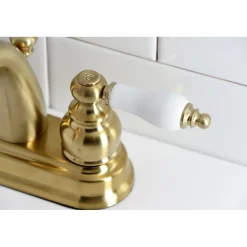Kingston Brass Restoration Deck Mount 4-Inch Centerset Bathroom Faucet