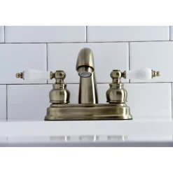Kingston Brass Restoration Deck Mount 4-Inch Centerset Bathroom Faucet