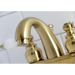 Kingston Brass Restoration Deck Mount 4-Inch Centerset Bathroom Faucet