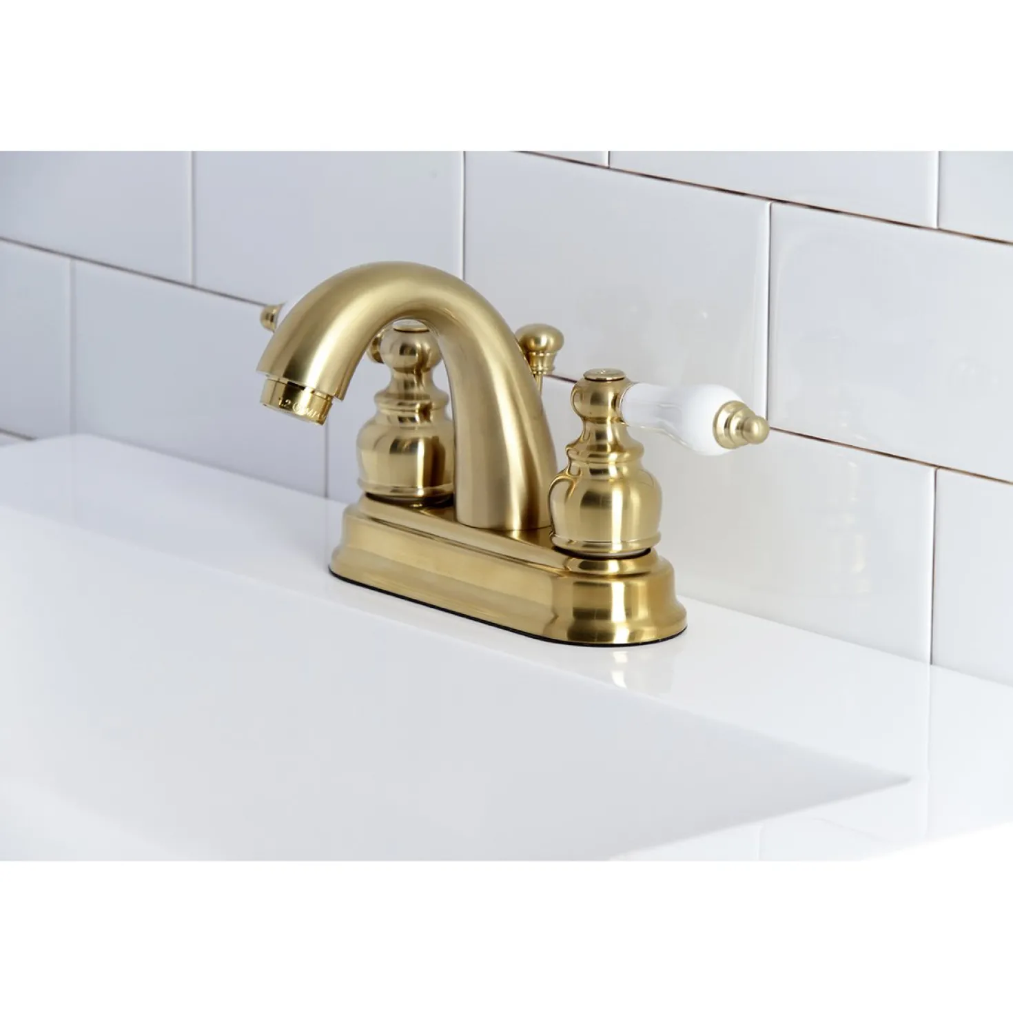 Kingston Brass Restoration Deck Mount 4-Inch Centerset Bathroom Faucet