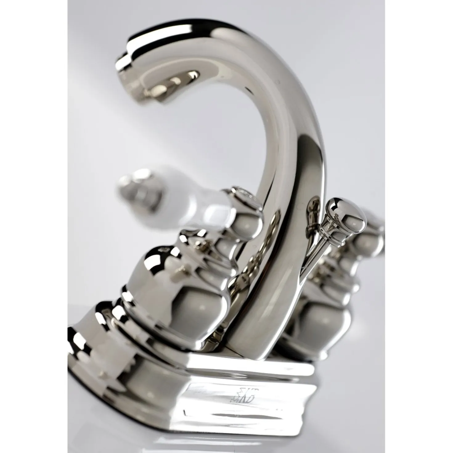 Kingston Brass Restoration Deck Mount 4-Inch Centerset Bathroom Faucet