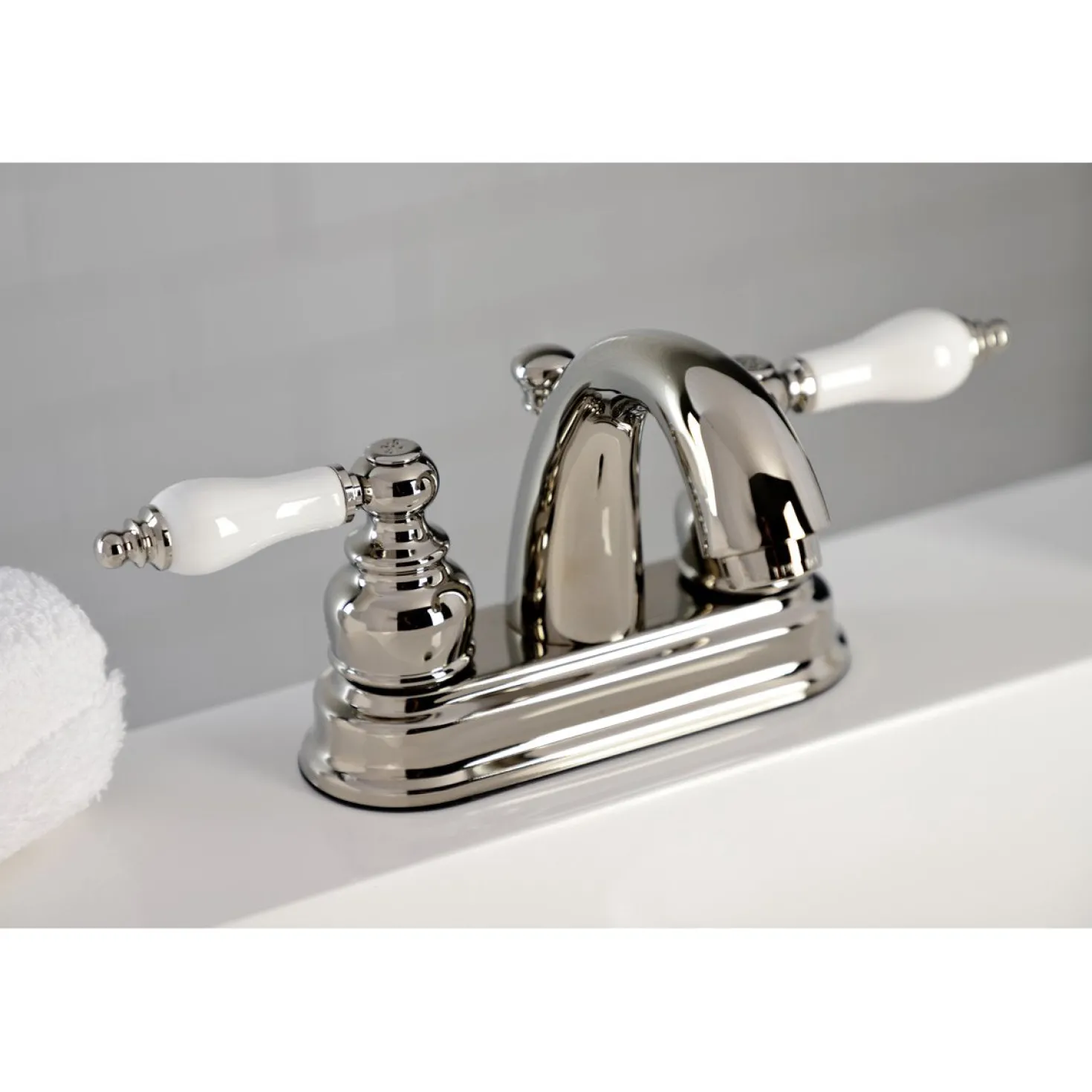 Kingston Brass Restoration Deck Mount 4-Inch Centerset Bathroom Faucet