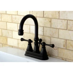 Kingston Brass Restoration Deck Mount 4-Inch Centerset Bathroom Faucet with Brass Pop-Up