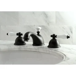 Kingston Brass Restoration Deck Mount 8-Inch Widespread Bathroom Faucet
