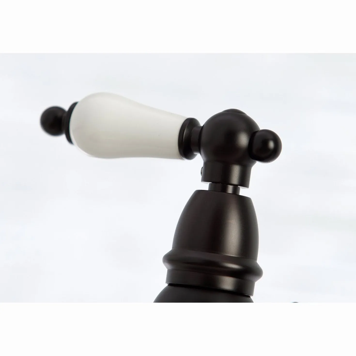 Kingston Brass Restoration 8-Inch Bridge Kitchen Faucet with Sprayer