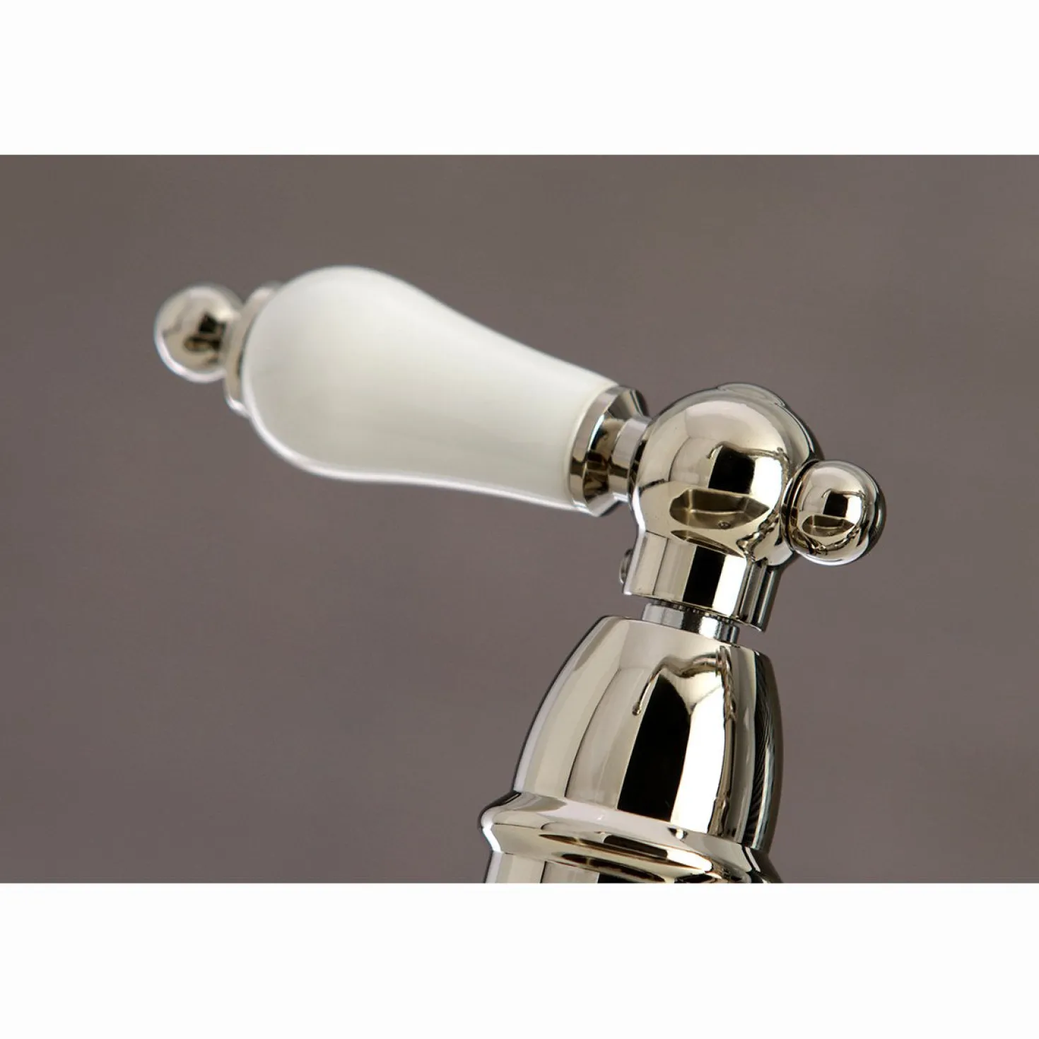 Kingston Brass Restoration 8-Inch Bridge Kitchen Faucet with Sprayer