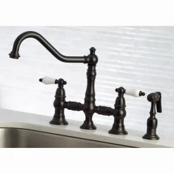 Kingston Brass Restoration 8-Inch Bridge Kitchen Faucet with Sprayer