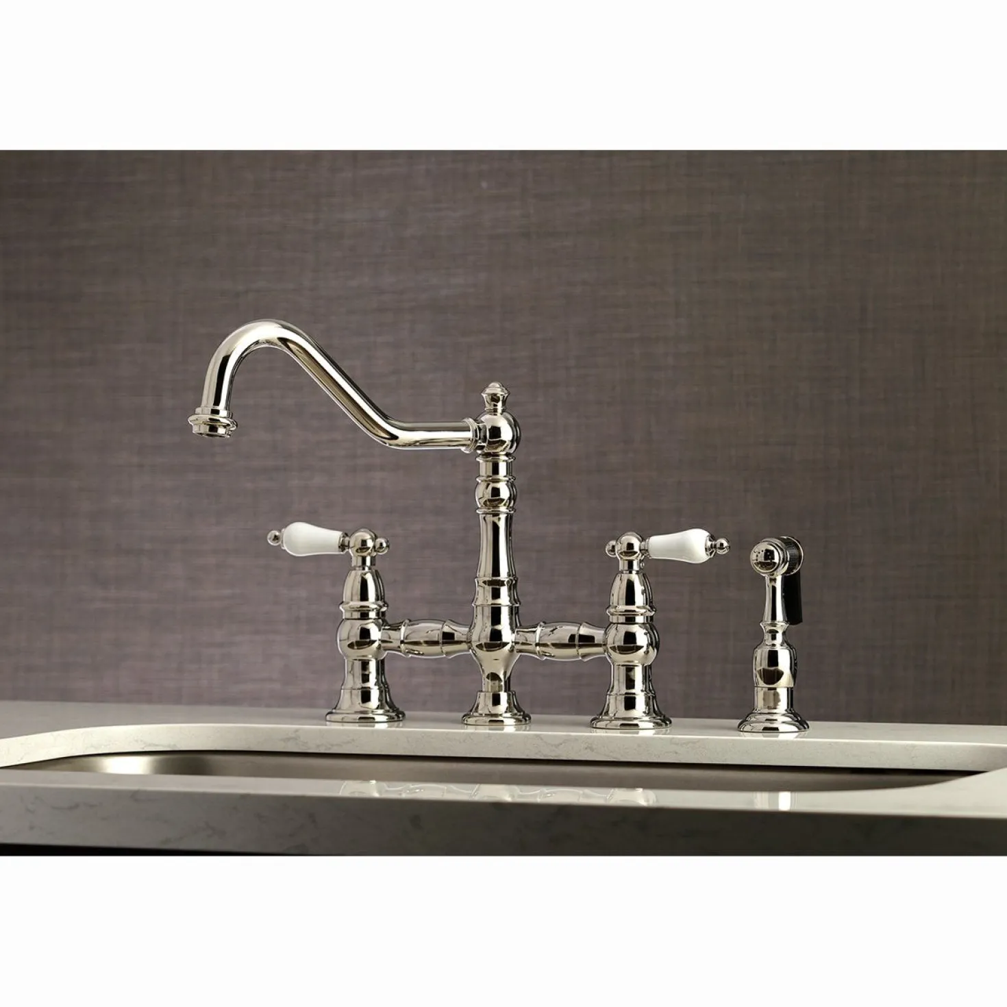 Kingston Brass Restoration 8-Inch Bridge Kitchen Faucet with Sprayer
