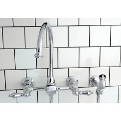 Kingston Brass Restoration 8-Inch Centerset Wall Mount Kitchen Faucet with Brass Sprayer