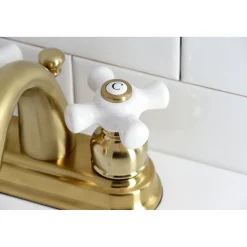 Kingston Brass Restoration 4-Inch Centerset Deck Mount Bathroom Faucet