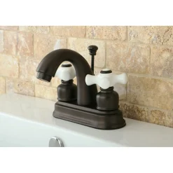 Kingston Brass Restoration 4-Inch Centerset Deck Mount Bathroom Faucet