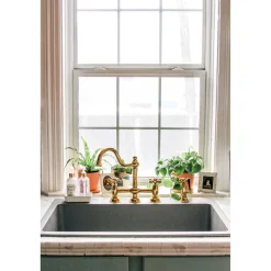 Kingston Brass Restoration Kitchen Bridge Faucet with Brass Sprayer