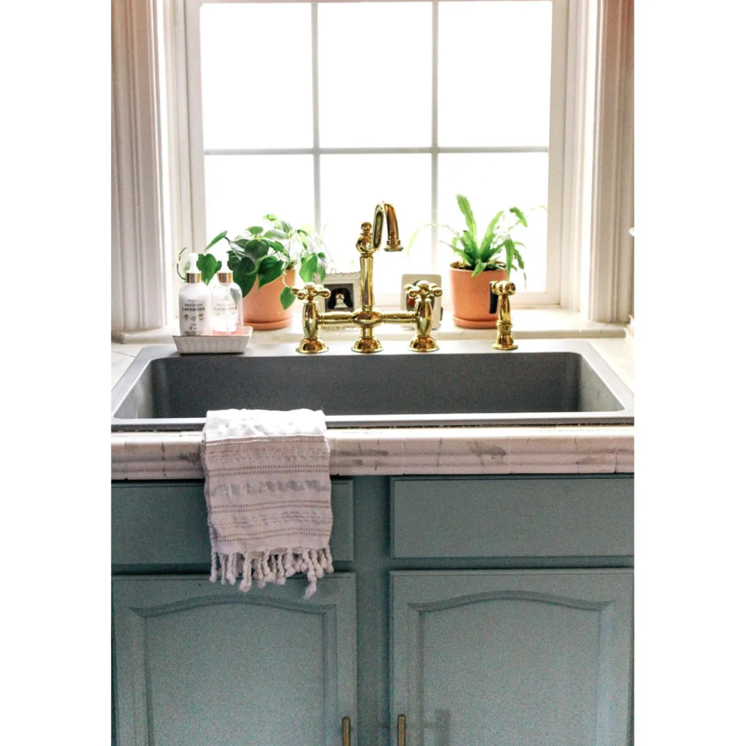 Kingston Brass Restoration Kitchen Bridge Faucet with Brass Sprayer