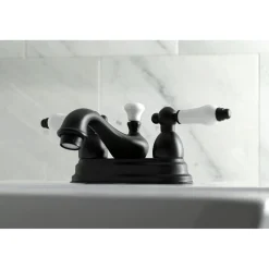 Kingston Brass Restoration Lever-Handle 4-Inch Centerset Bathroom Faucet