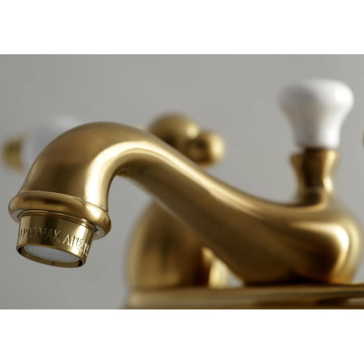 Kingston Brass Restoration Lever-Handle 4-Inch Centerset Bathroom Faucet