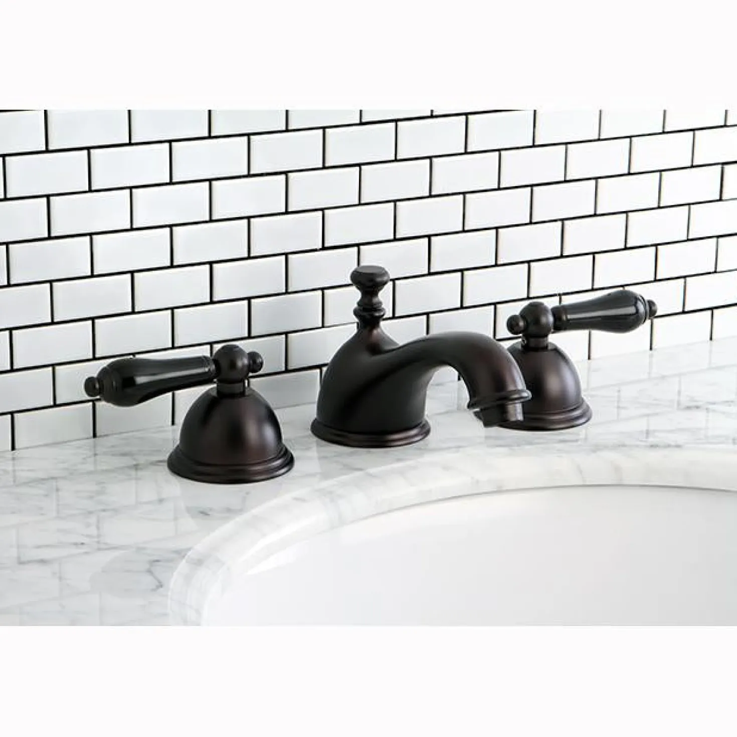 Kingston Brass Restoration Onyx Widespread Lavatory Faucet with Black Porcelain Lever Handle