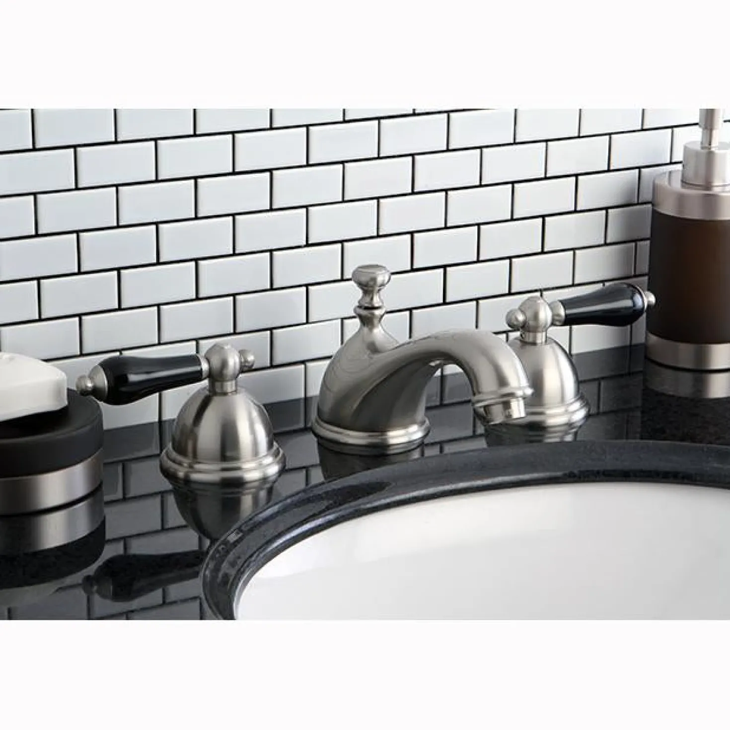 Kingston Brass Restoration Onyx Widespread Lavatory Faucet with Black Porcelain Lever Handle