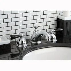 Kingston Brass Restoration Onyx Widespread Lavatory Faucet with Black Porcelain Lever Handle