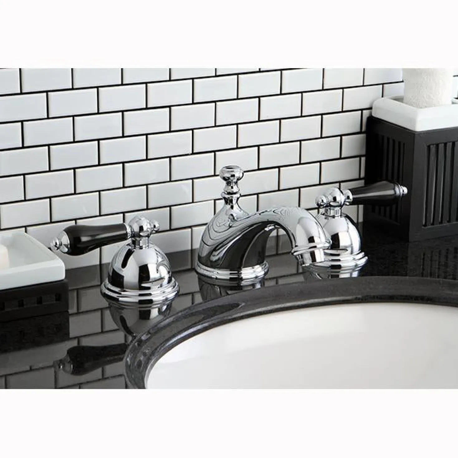 Kingston Brass Restoration Onyx Widespread Lavatory Faucet with Black Porcelain Lever Handle